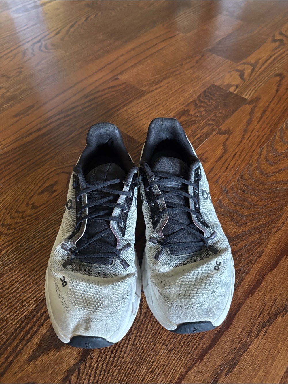 On Cloud Women’s Running Shoes in Light Gray and Black
